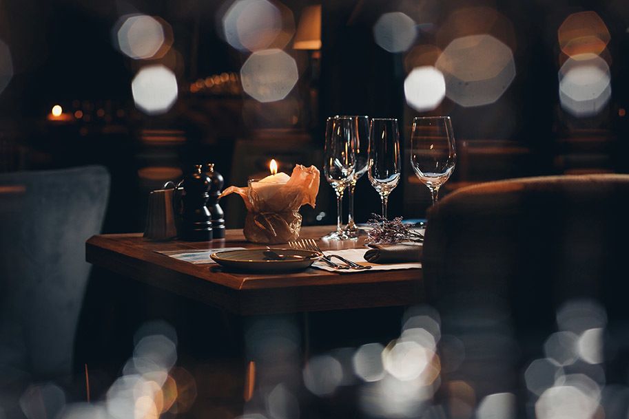 a restaurant table with a handsome setting for father's day